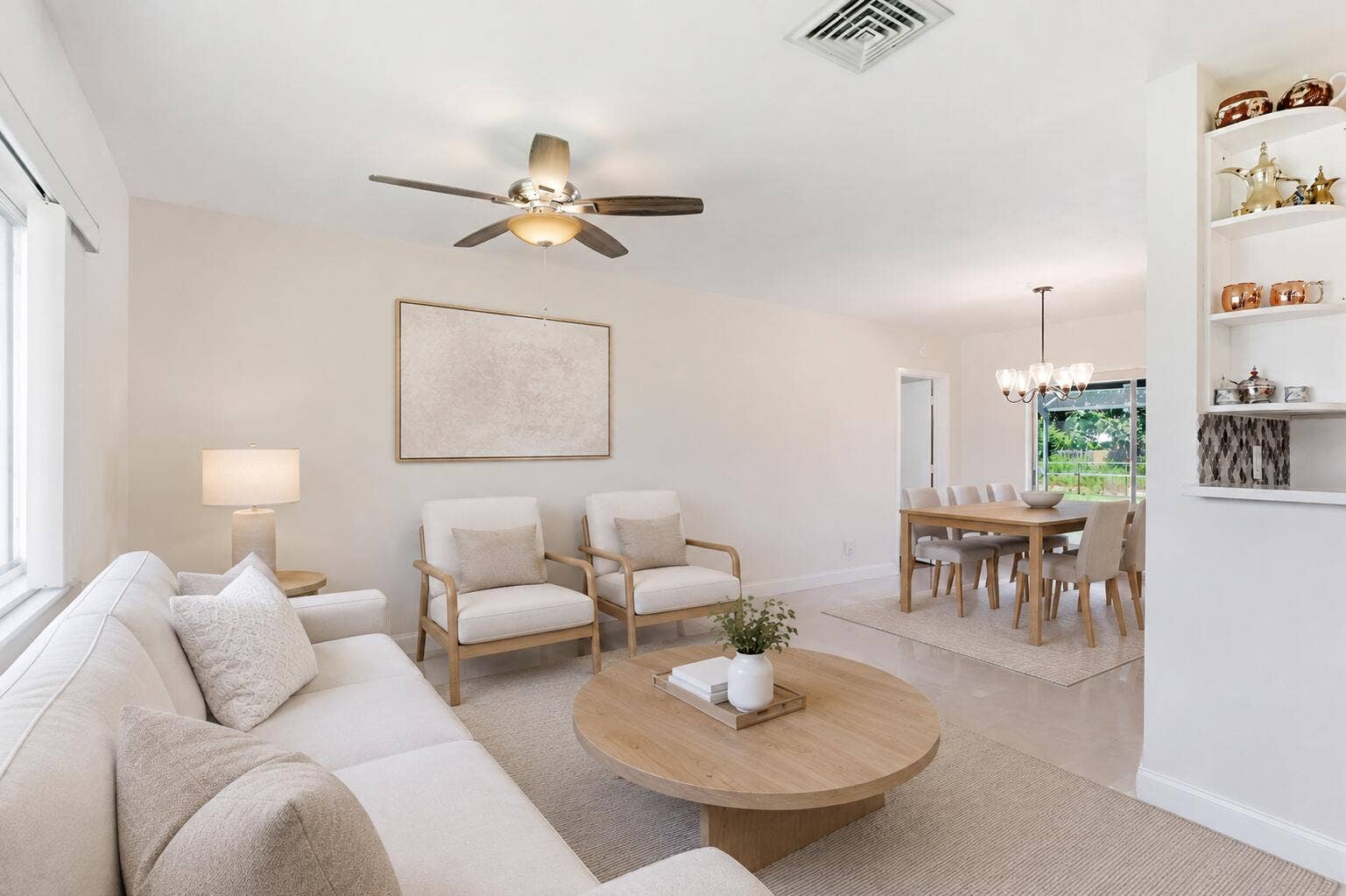 115 Orchard Ridge Lane, Boca Raton, FL 33431 Living/Dining Room. (virtually staged for illustrative purposes; no permanent features or finishes have been altered)