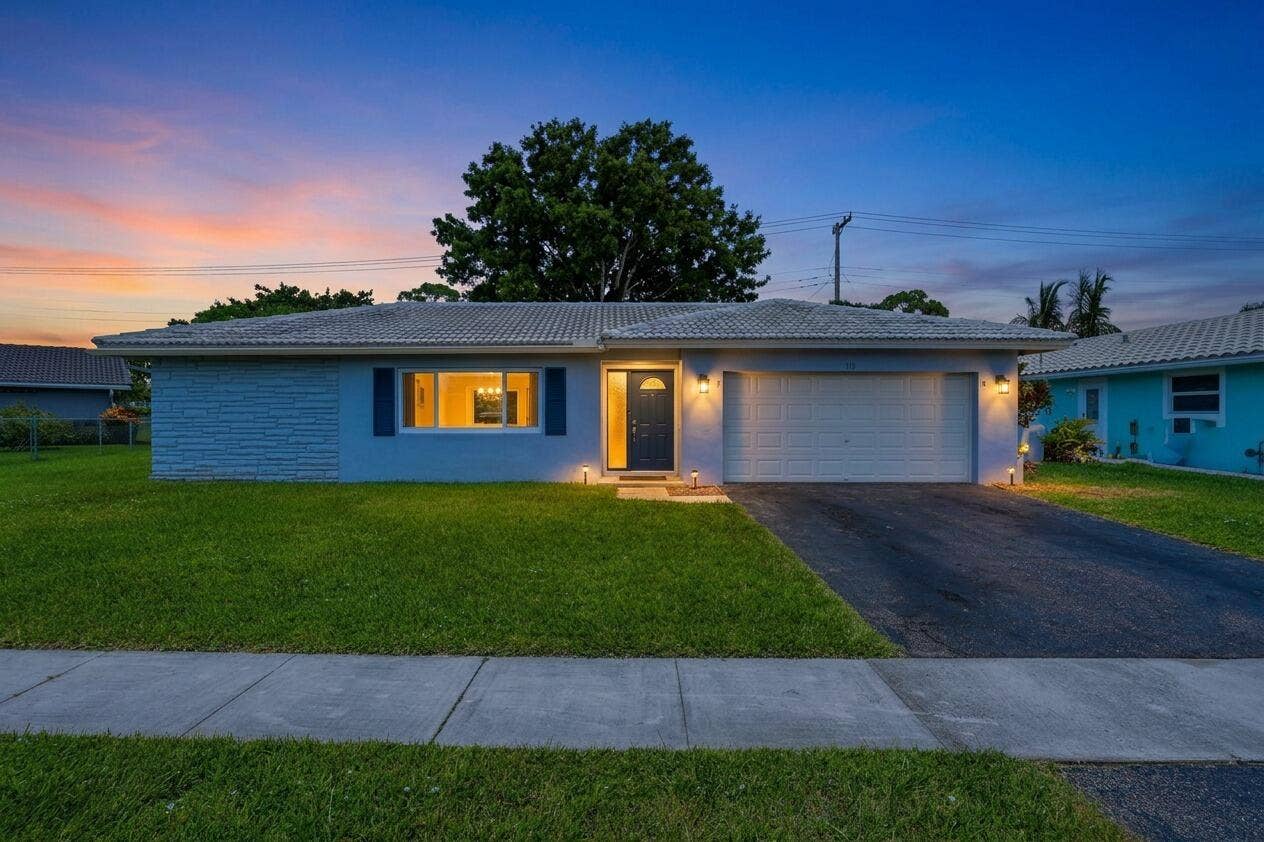 115 Orchard Ridge Lane, Boca Raton, FL 33431 Twilight front of house