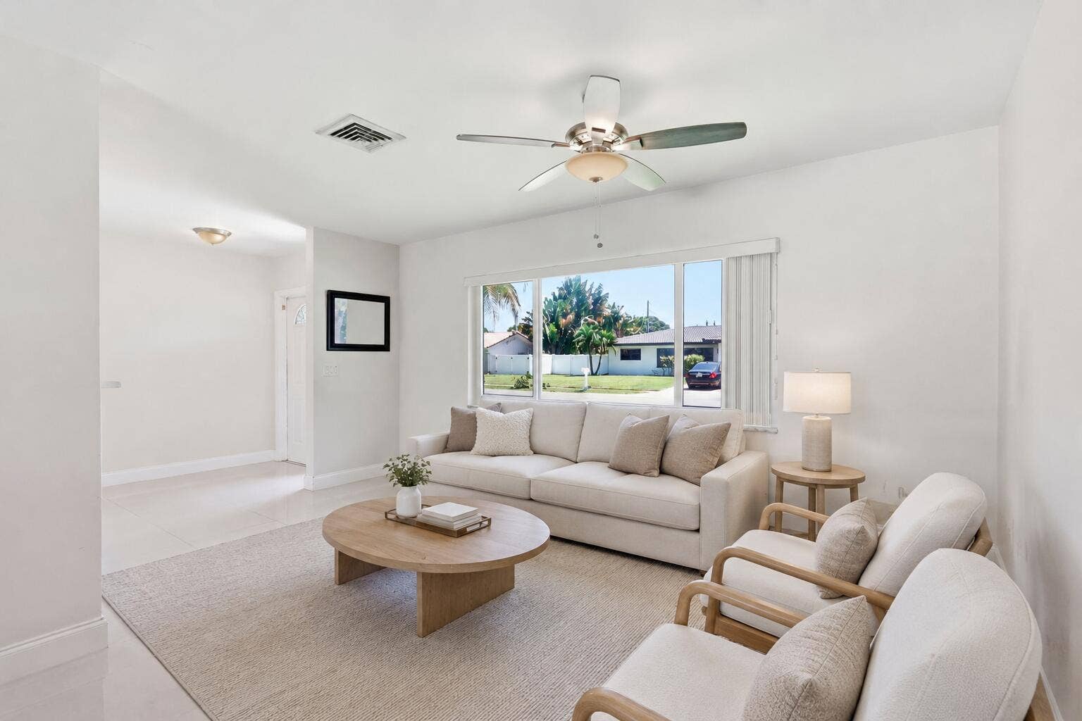 115 Orchard Ridge Lane, Boca Raton, FL 33431 Front Entry and Living Room (virtually staged for illustrative purposes; no permanent features or finishes have been altered)