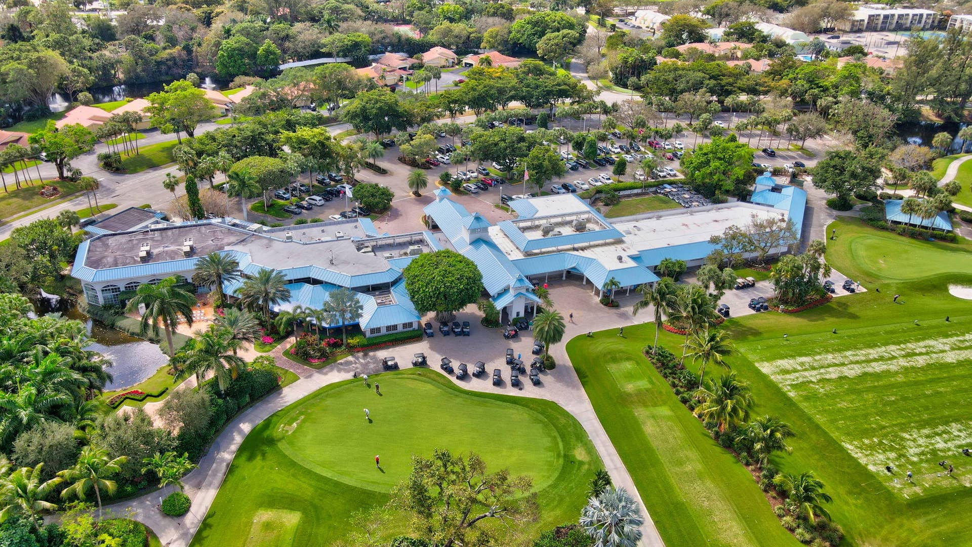 663 DEER CREEK HOLLOWS Circle, Deerfield Beach, FL 33442 Rear view of clubhouse.