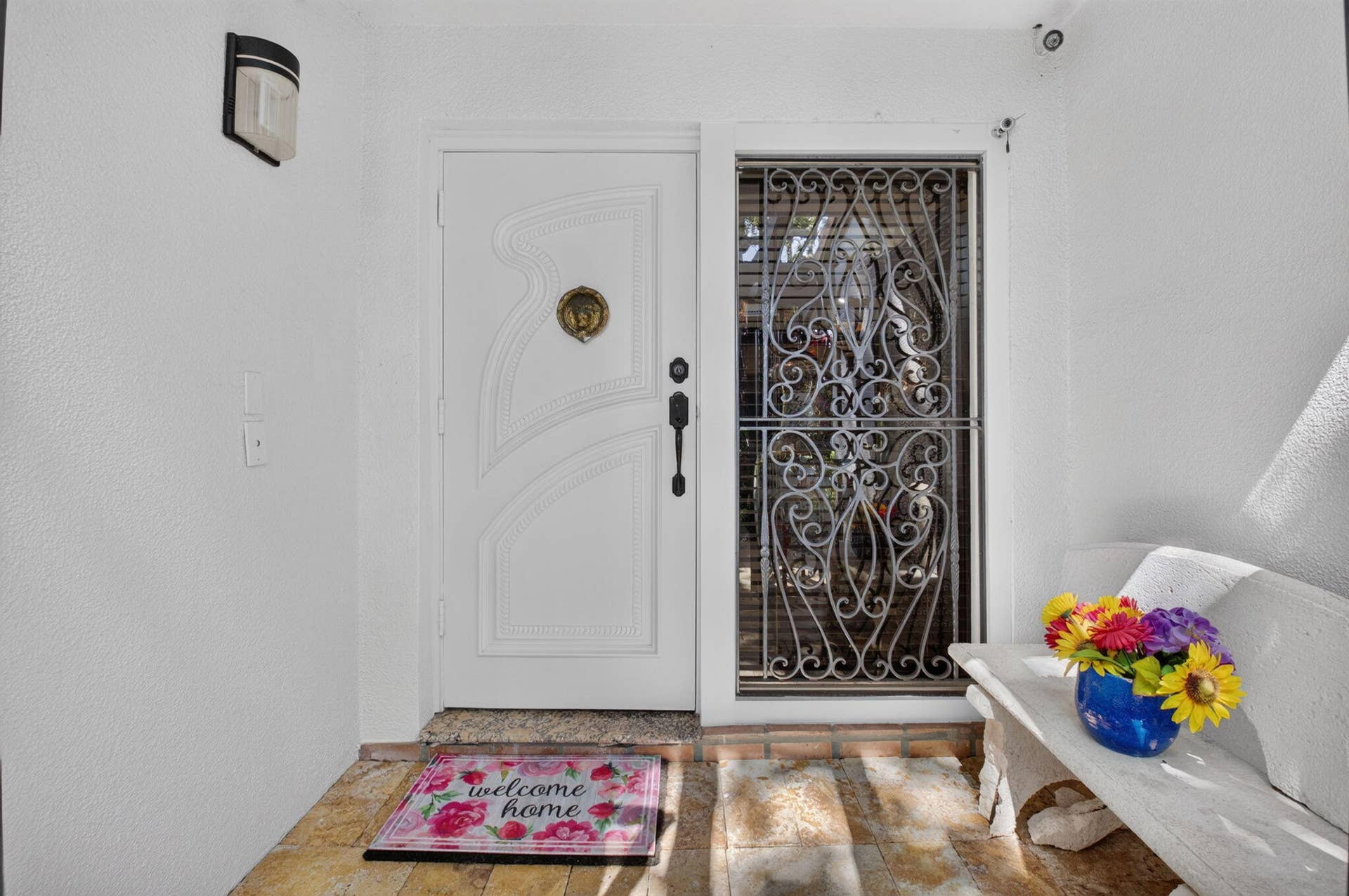 663 DEER CREEK HOLLOWS Circle, Deerfield Beach, FL 33442 Inviting front entry with a double sidelight.