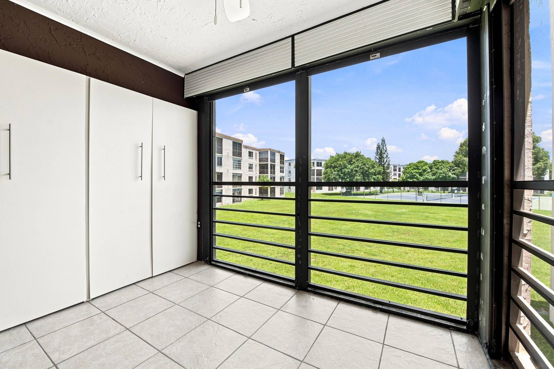 Screened-in Balcony with storage