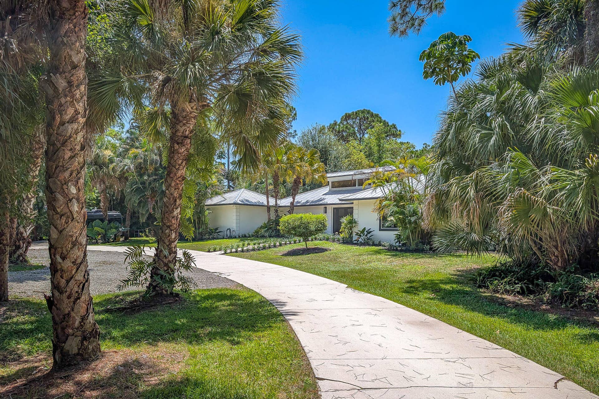 8166 150th Court N, Palm Beach Gardens, FL 33418 59-Front Exterior