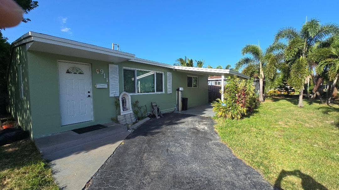 911 NE 58TH Street, Oakland Park, FL 33334 J3