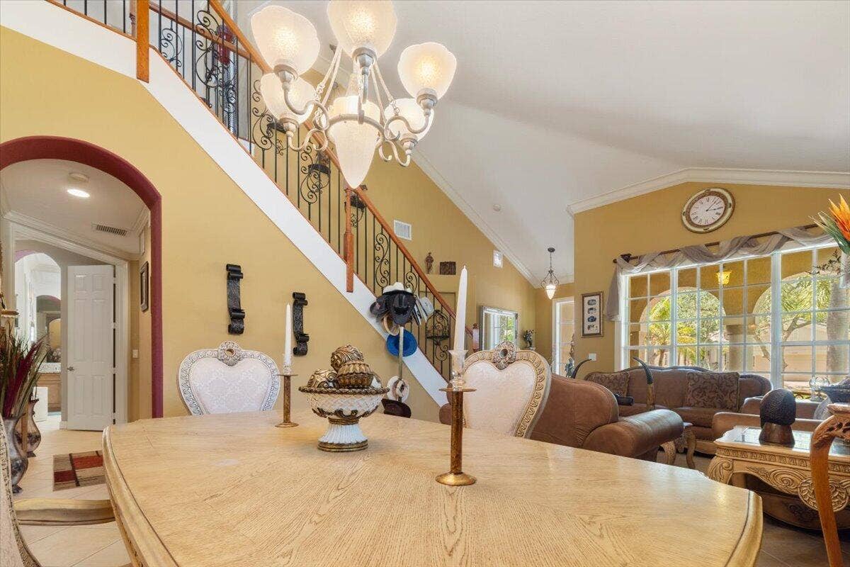 12390 NW 78th Manor, Parkland, FL 33076 The master bedroom and the 4th bedroom /Gymnasium are both on the ground floor with 2 full bathrooms down also,