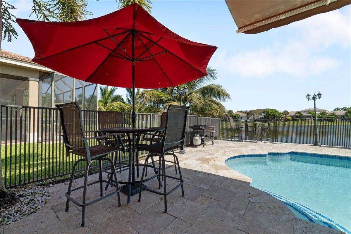 12390 NW 78th Manor, Parkland, FL 33076 Hightop cocktail or BBQ tables for poolside dining, all included!