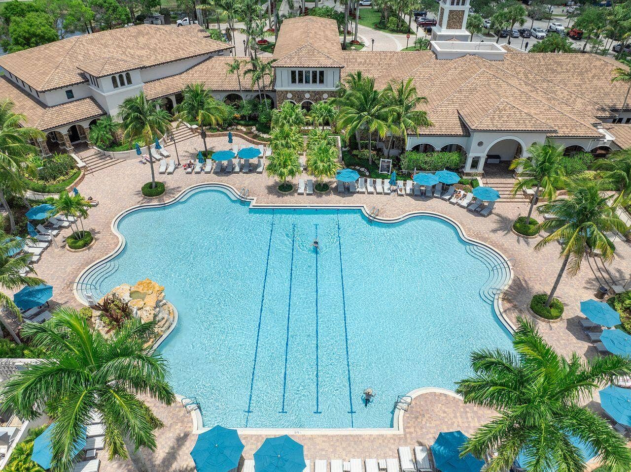 12390 NW 78th Manor, Parkland, FL 33076 Plaza Del Largo aerial view of the clubhouse pool on a clear day