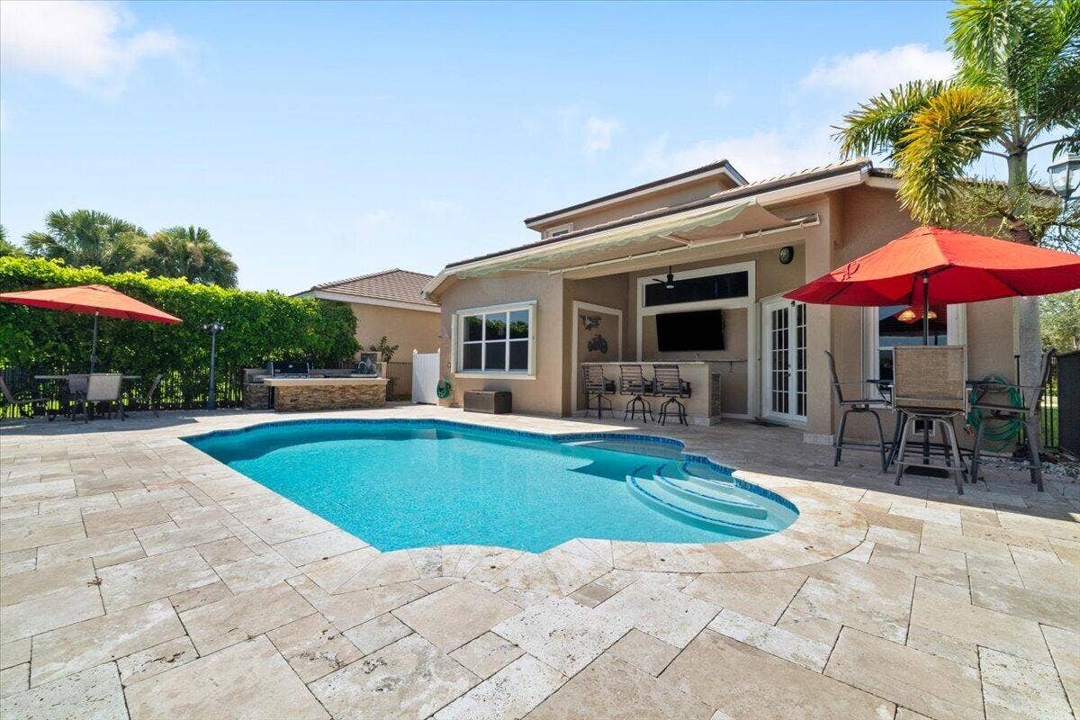 12390 NW 78th Manor, Parkland, FL 33076 Dont forget to bring your swimsuit, that is all you need to bring as this home comes fully furnished.. towels included!
