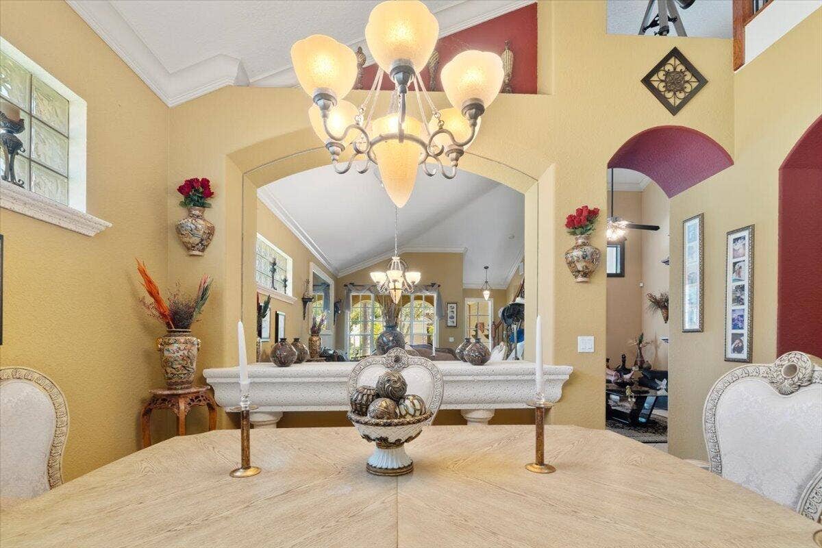 12390 NW 78th Manor, Parkland, FL 33076 The living room view from the formal dining table