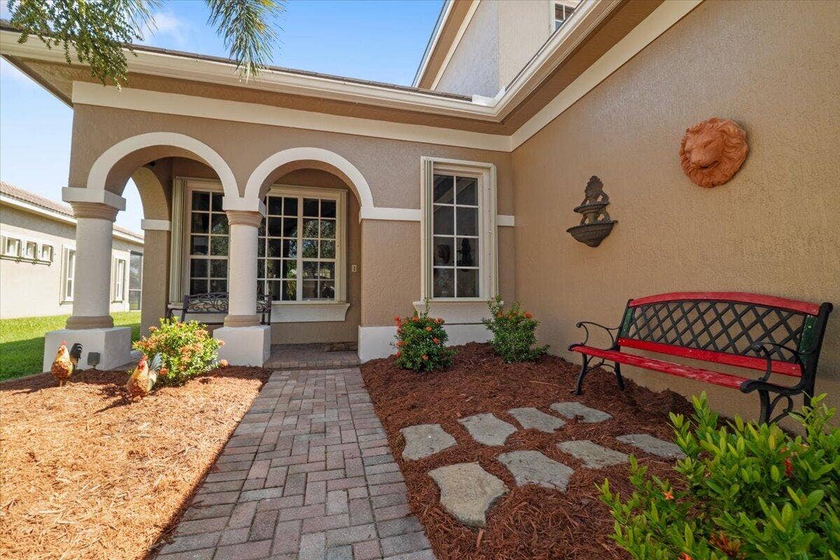 12390 NW 78th Manor, Parkland, FL 33076 The footpath towards the front pretty relaxing patio and front entryway