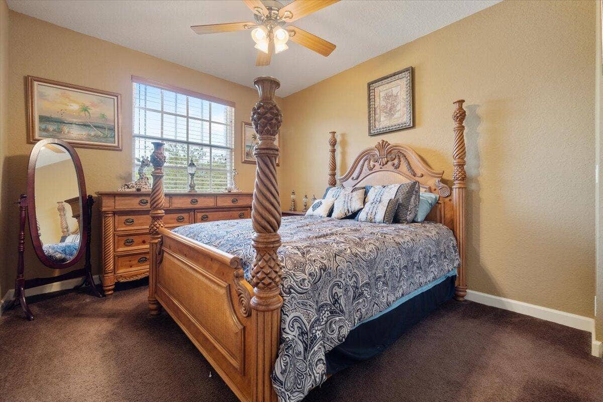12390 NW 78th Manor, Parkland, FL 33076 The upstairs front bedroom on the other side of the loft