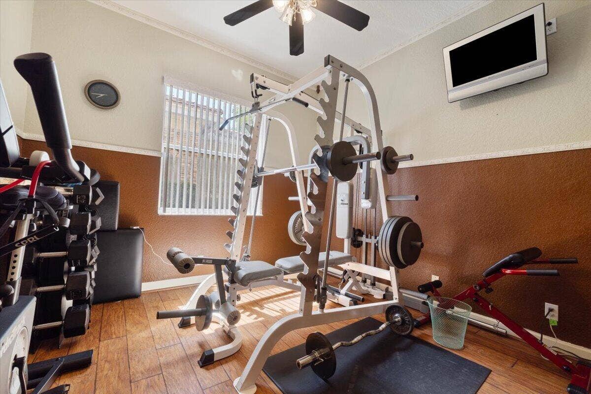 12390 NW 78th Manor, Parkland, FL 33076 The 4th bedroom is used as a weight and Training room with every workout procedure imaginable, All equipment is included