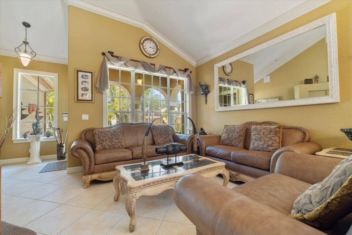 12390 NW 78th Manor, Parkland, FL 33076 This furniture is like brand new, The leather couches have been taken such good care of tey have not a scratch on them, Tommy Bahama style solid quality 3 piece couch and loveseat set with matching coffee table and formal dining room set all included,