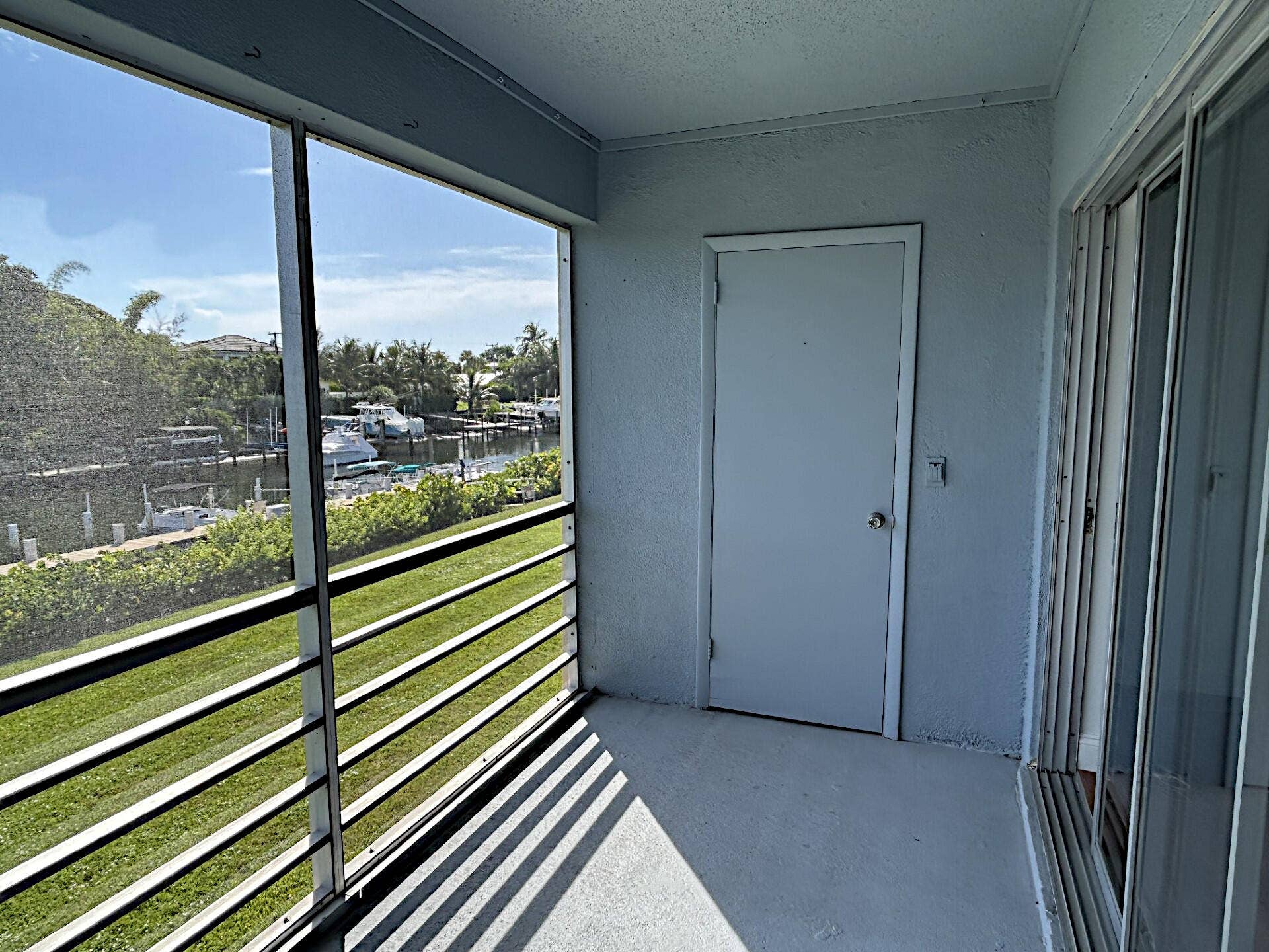 342 Southwind Drive, #203, North Palm Beach, FL 33408 Screened Balcony1