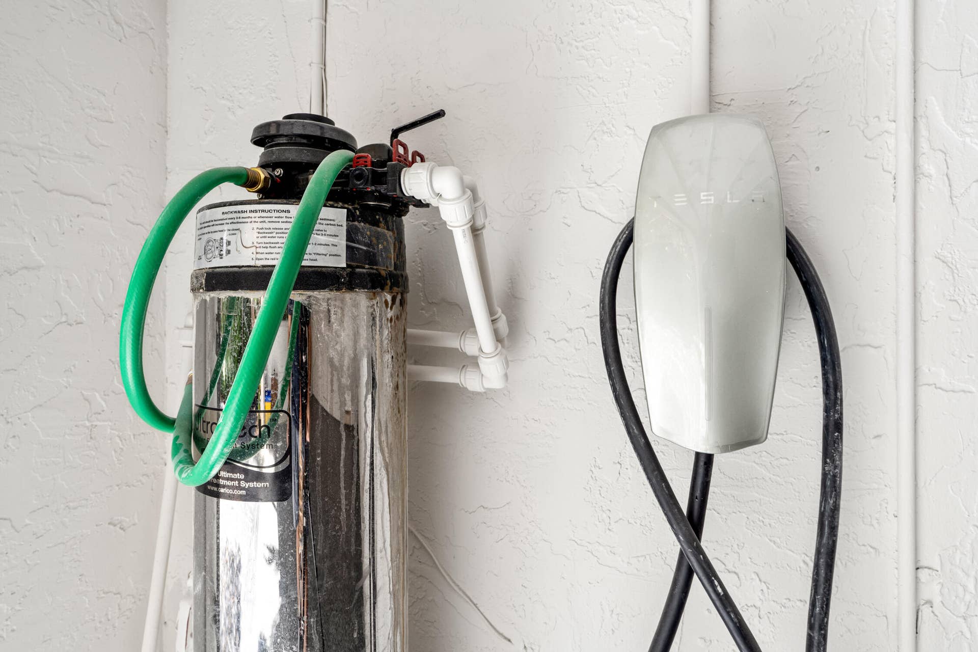 The garage has an EV charger, central vacuum, and a whole-home water filtration system.