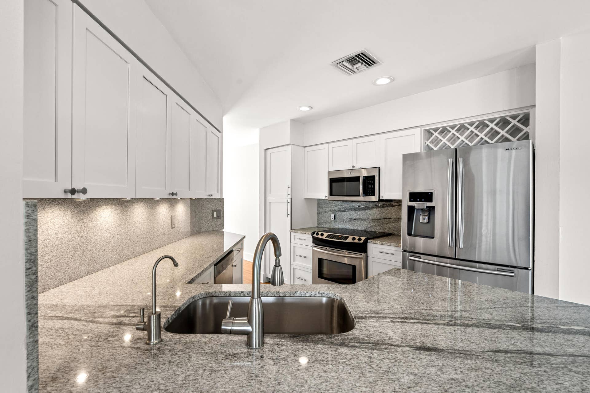 The kitchen is nice and bright.