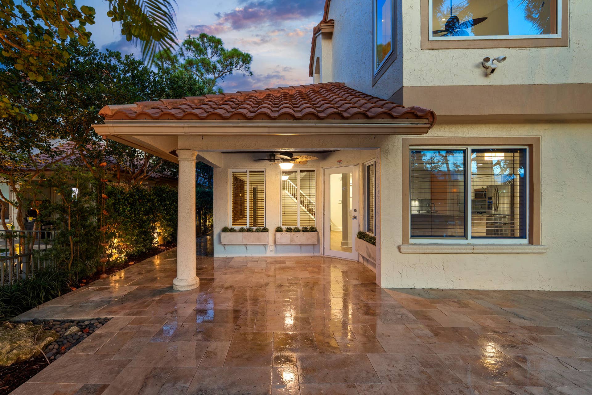 Enjoy the expansive travertine patio, perfect for relaxing and entertaining.