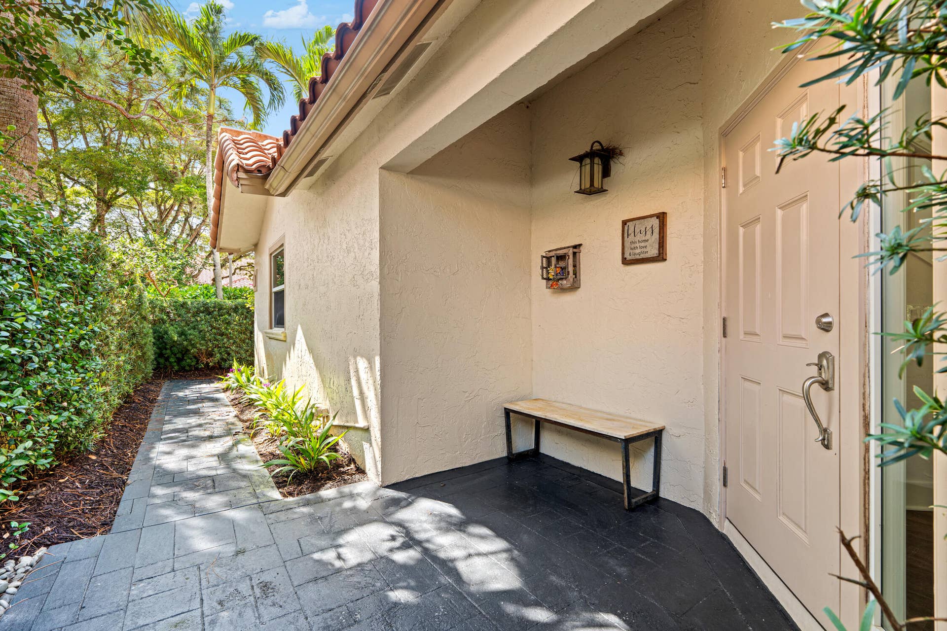 The front entrance is on the side of the house since this is a corner unit.