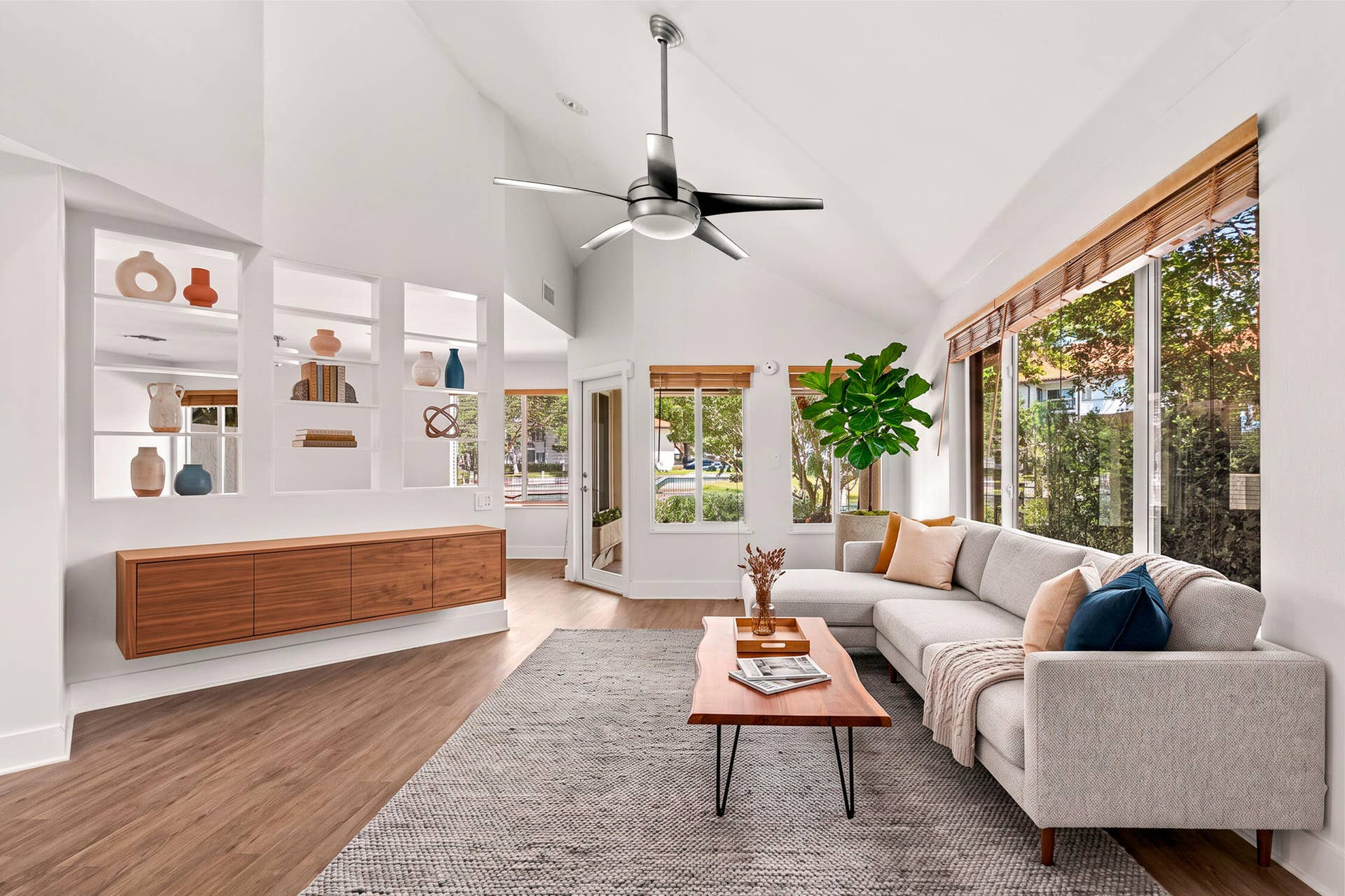 A living room that is nicely separated from the family room