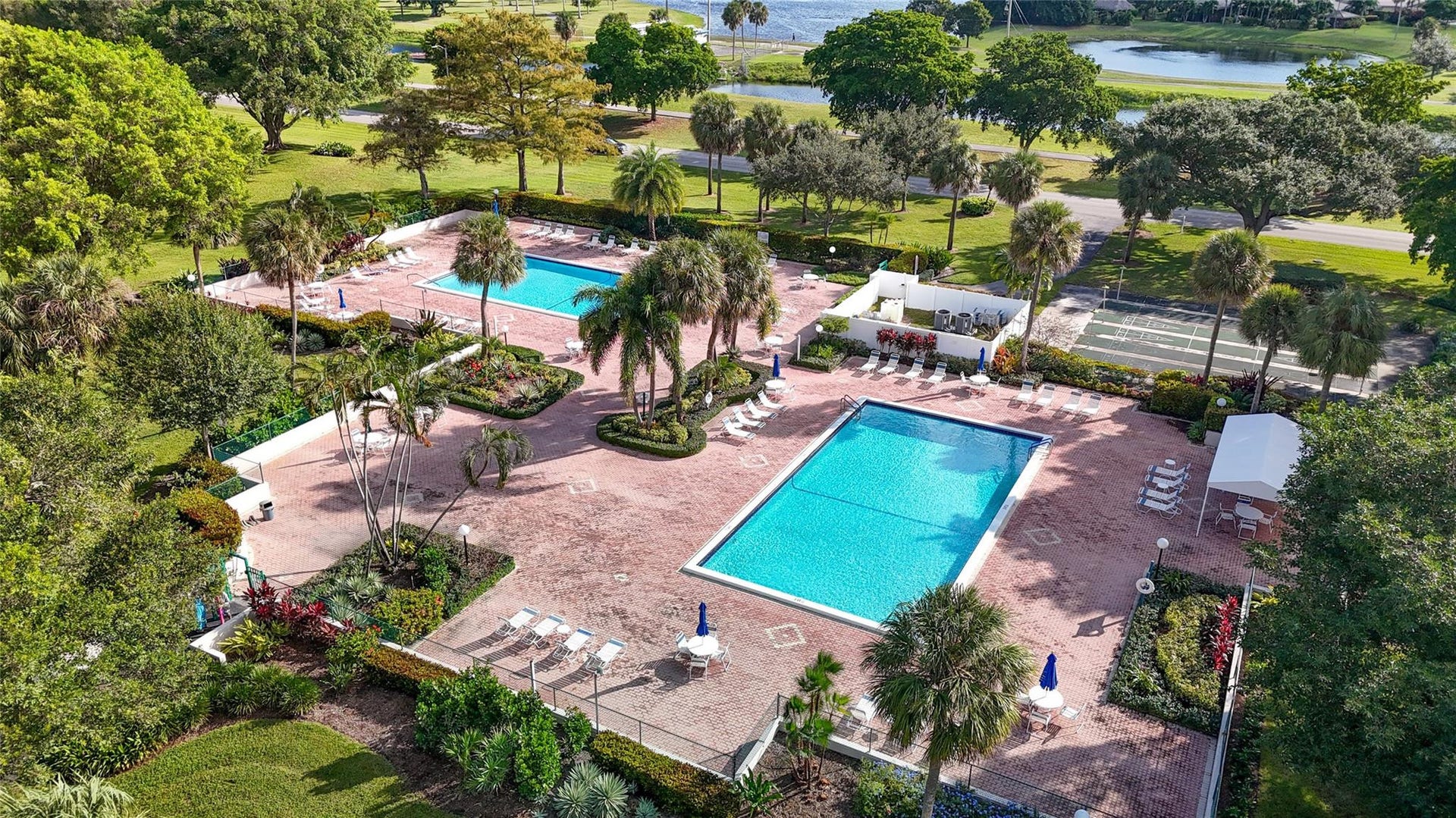 545 Oaks Lane, #410, Pompano Beach, FL 33069 2 pools (one heated) surrounded by lushious landscaping