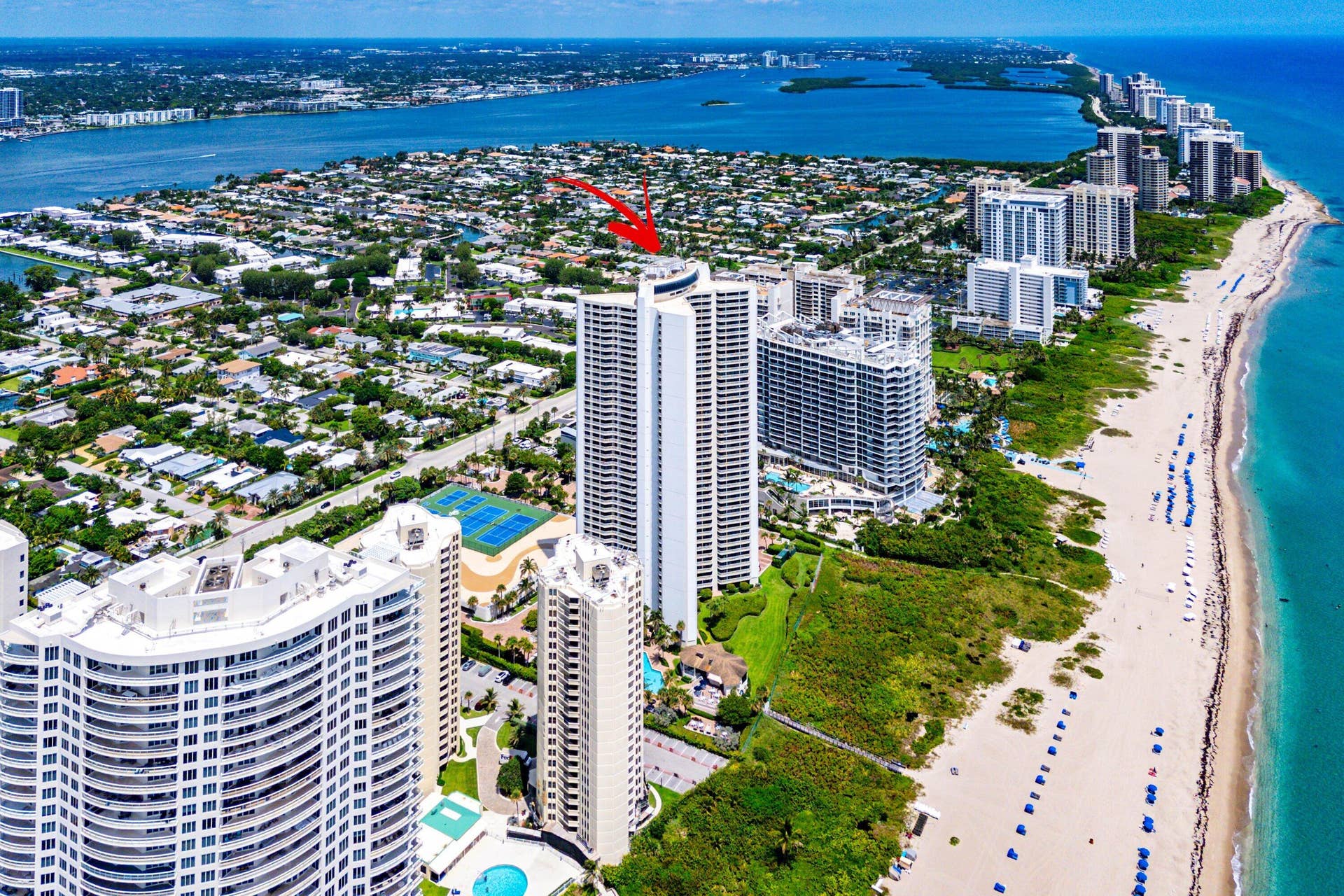 Aerial perspective identifies Tiara along Singer Island's oceanfront, with the Atlantic to the east and Intracoastal Waterway to the west.