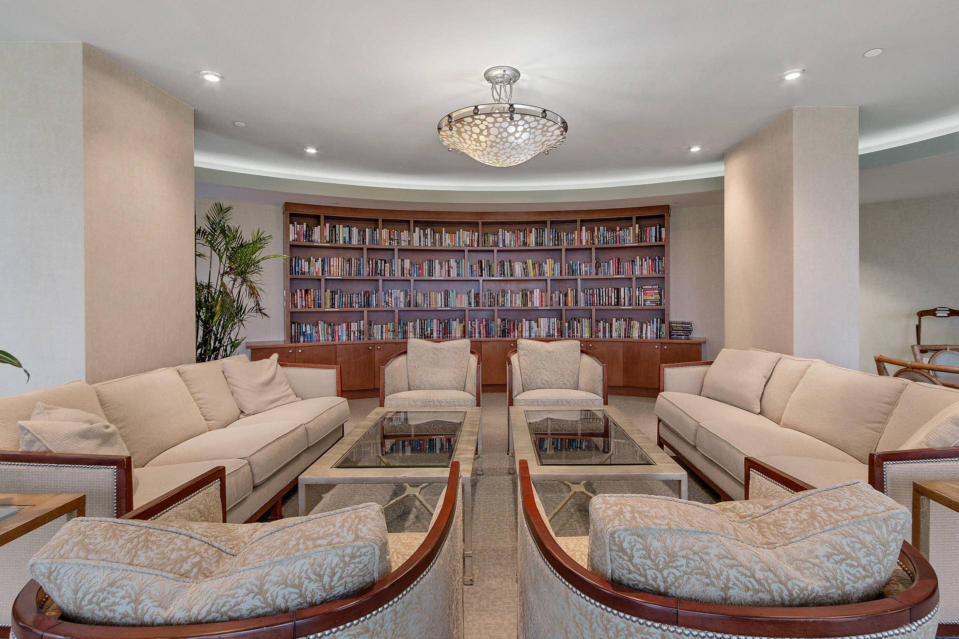 Tiara's library provides built-in book storage and comfortable conversation seating in a quieter community setting.