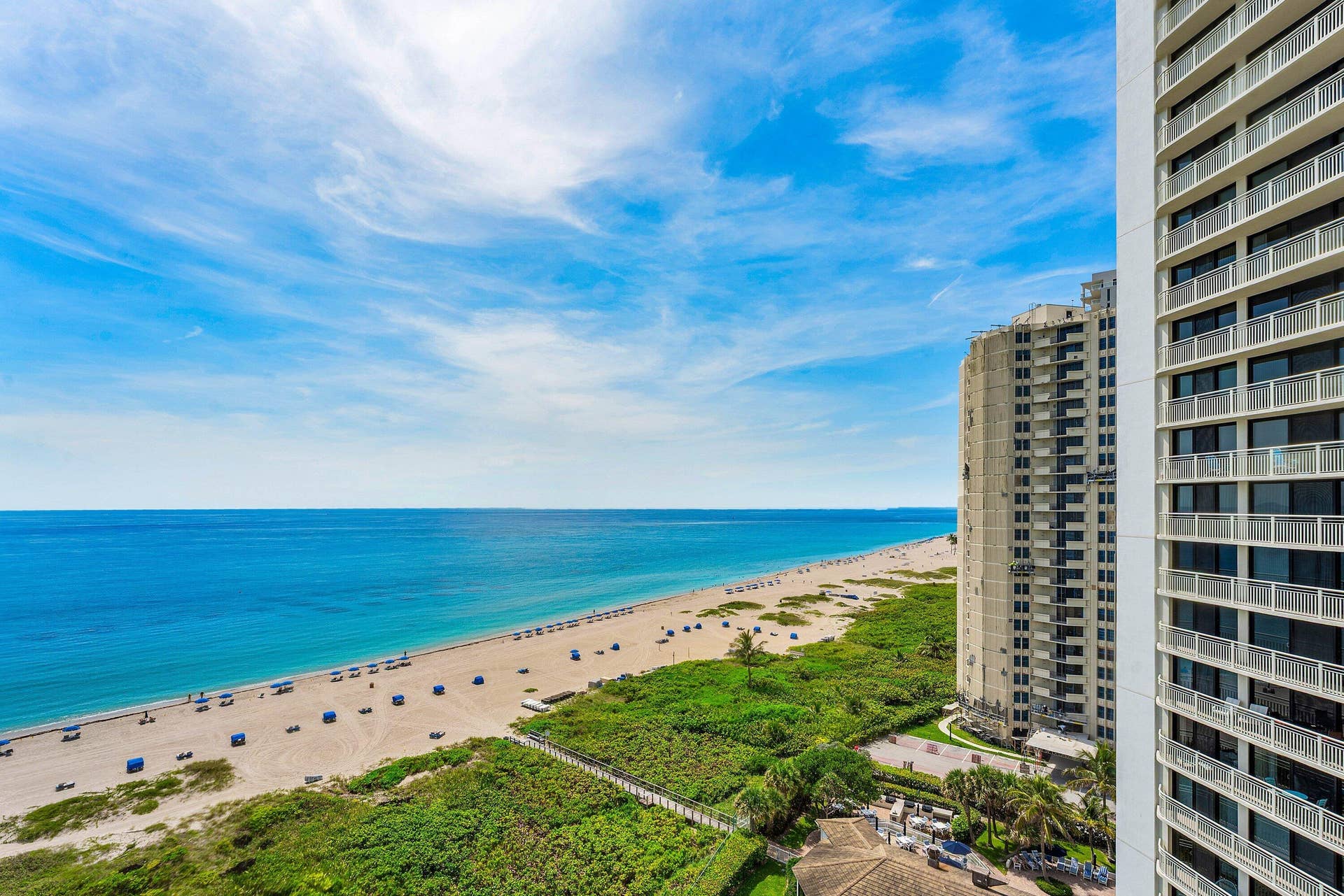 Unobstructed Atlantic Ocean and beach views stretch along the Singer Island shoreline.