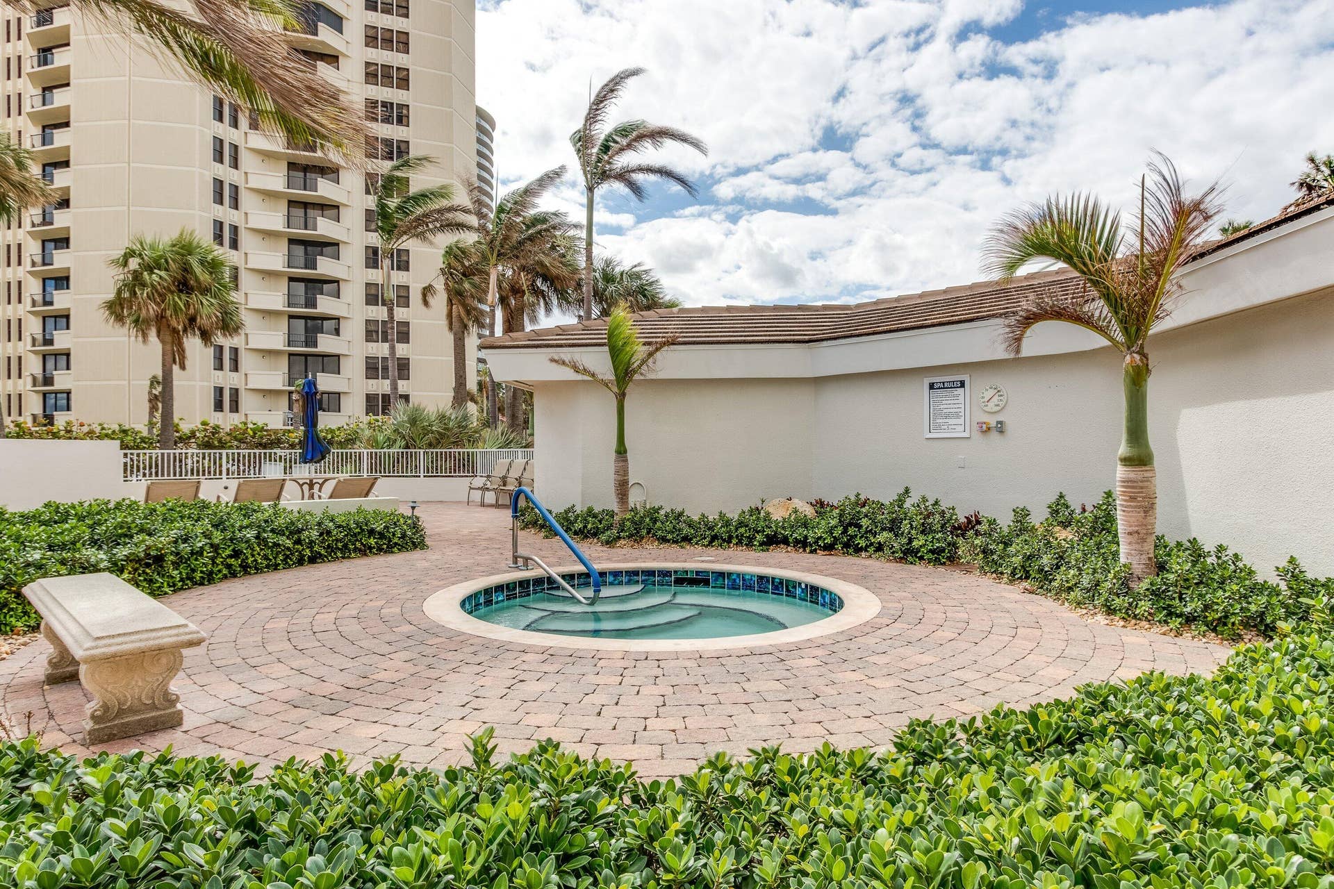The in-ground spa provides a separate place to unwind within Tiara's outdoor amenity area.