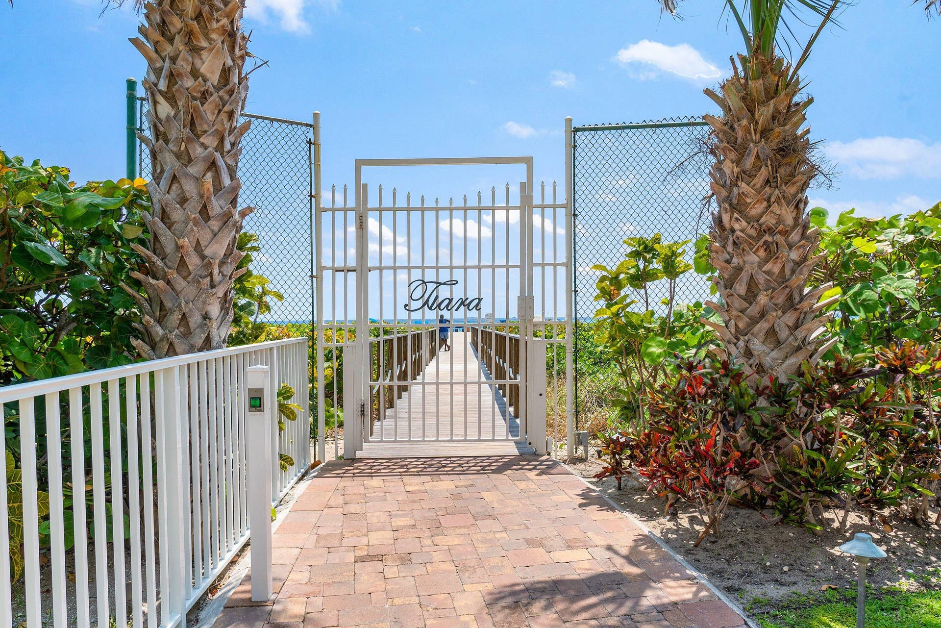 Gated beach access leads from Tiara to the boardwalk and Atlantic shoreline, completing the community's direct-to-sand lifestyle.