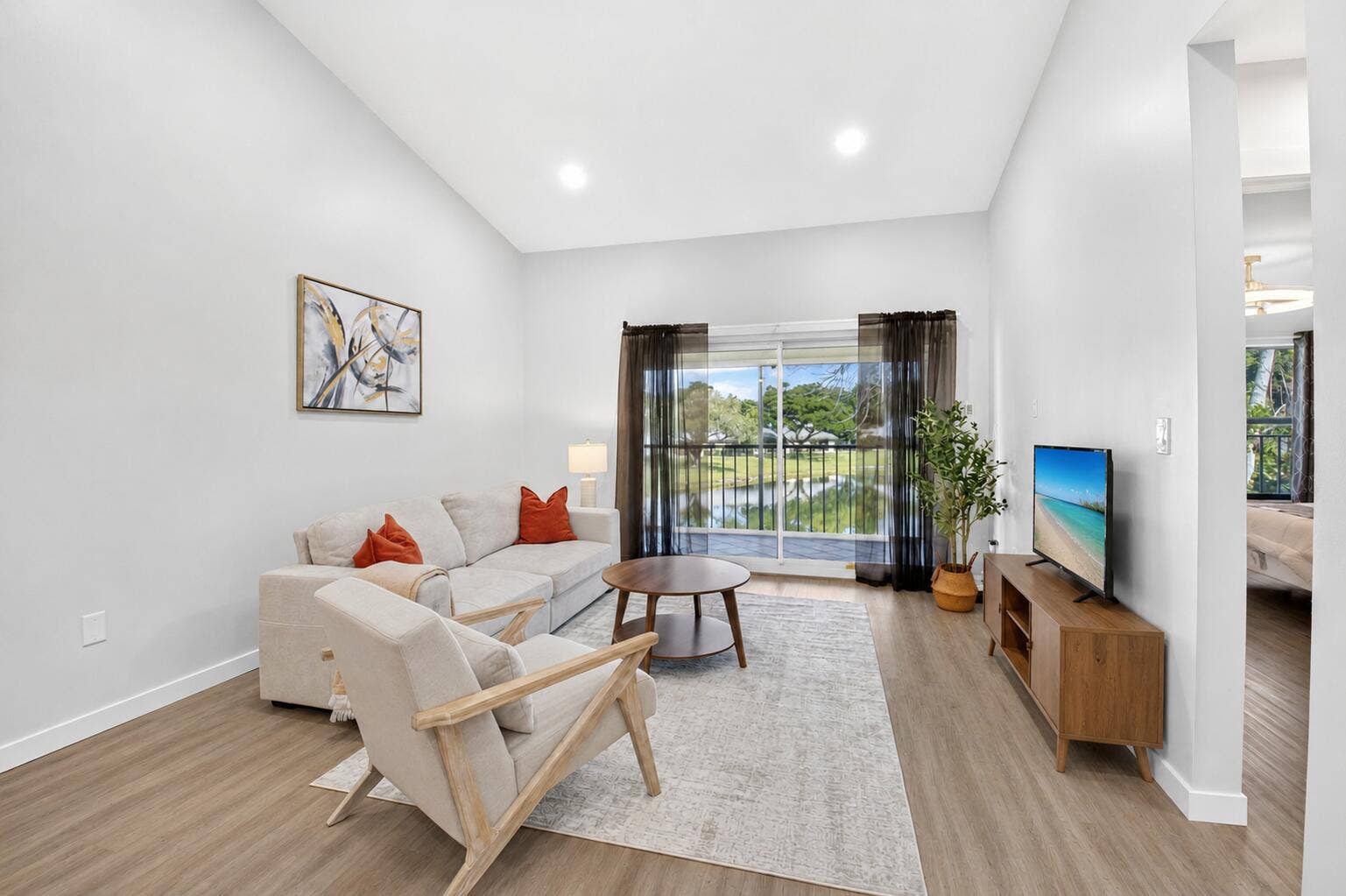 8342 E Boca Glades Boulevard, #234, Boca Raton, FL 33434 Living room-Partially Virtually Staged