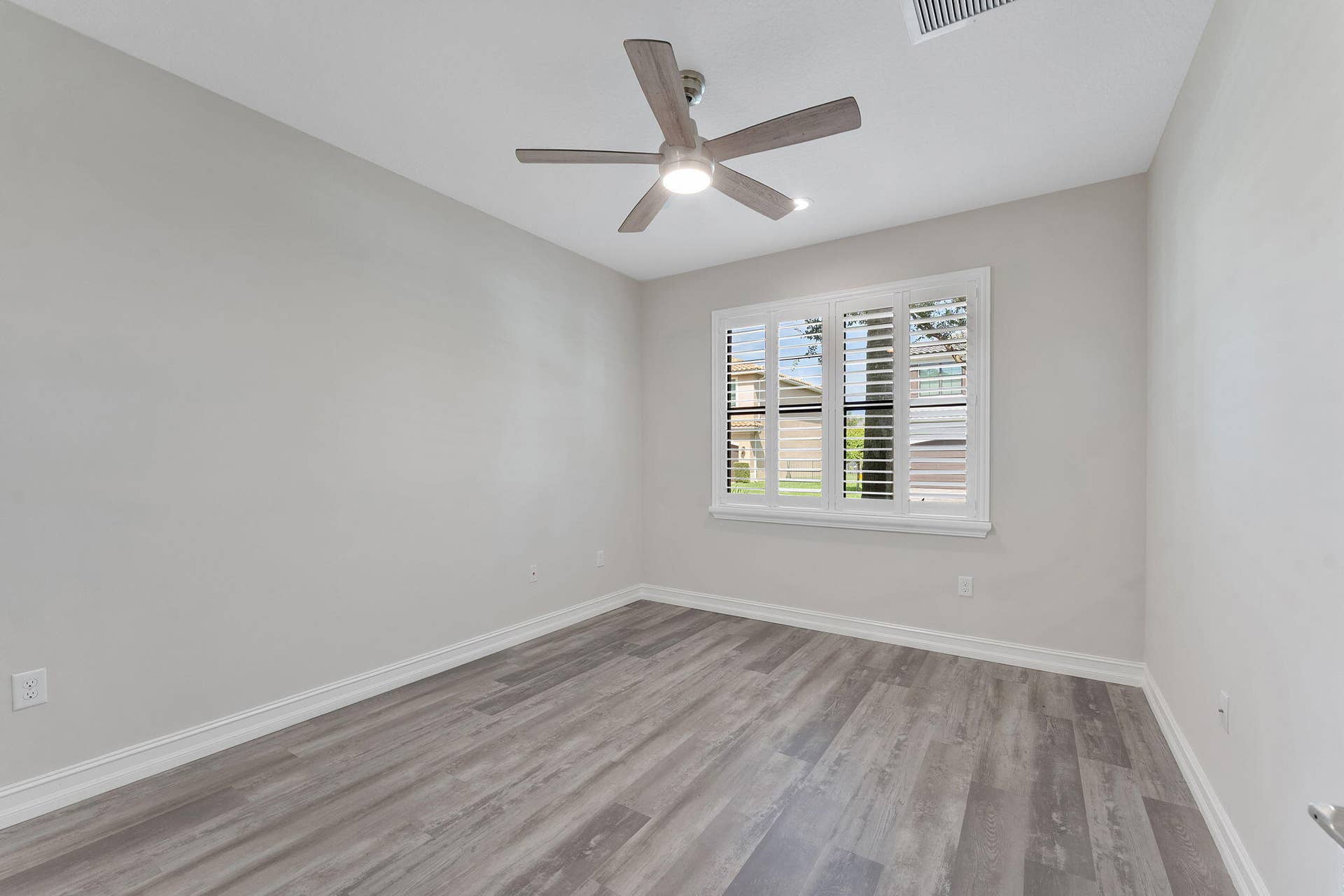 14545 Alabaster Avenue, Delray Beach, FL 33446 Bedroom #2 - new floors and fan.