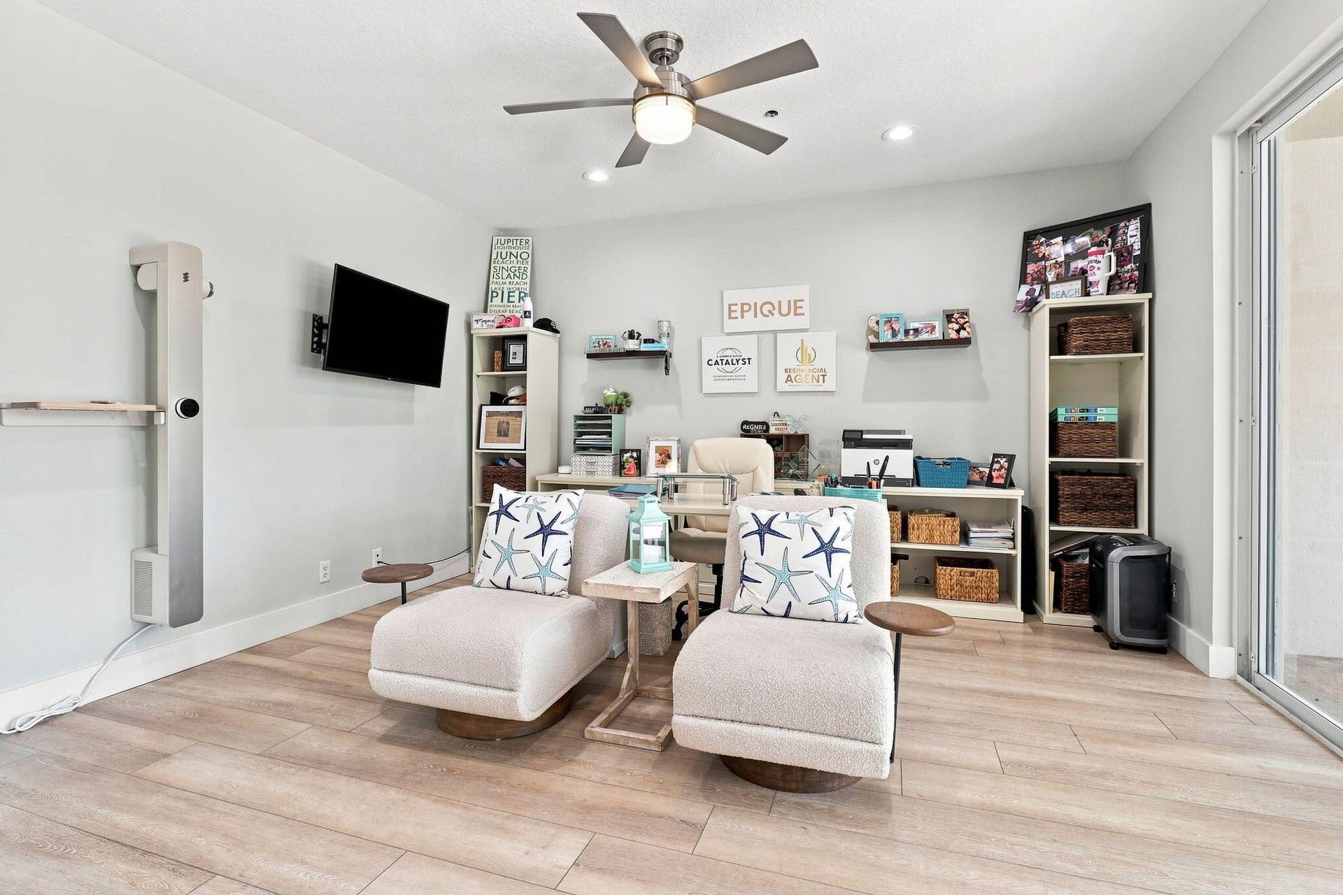 Luxury vinyl flooring, recessed lighting and a ceiling fan with integrated lighting