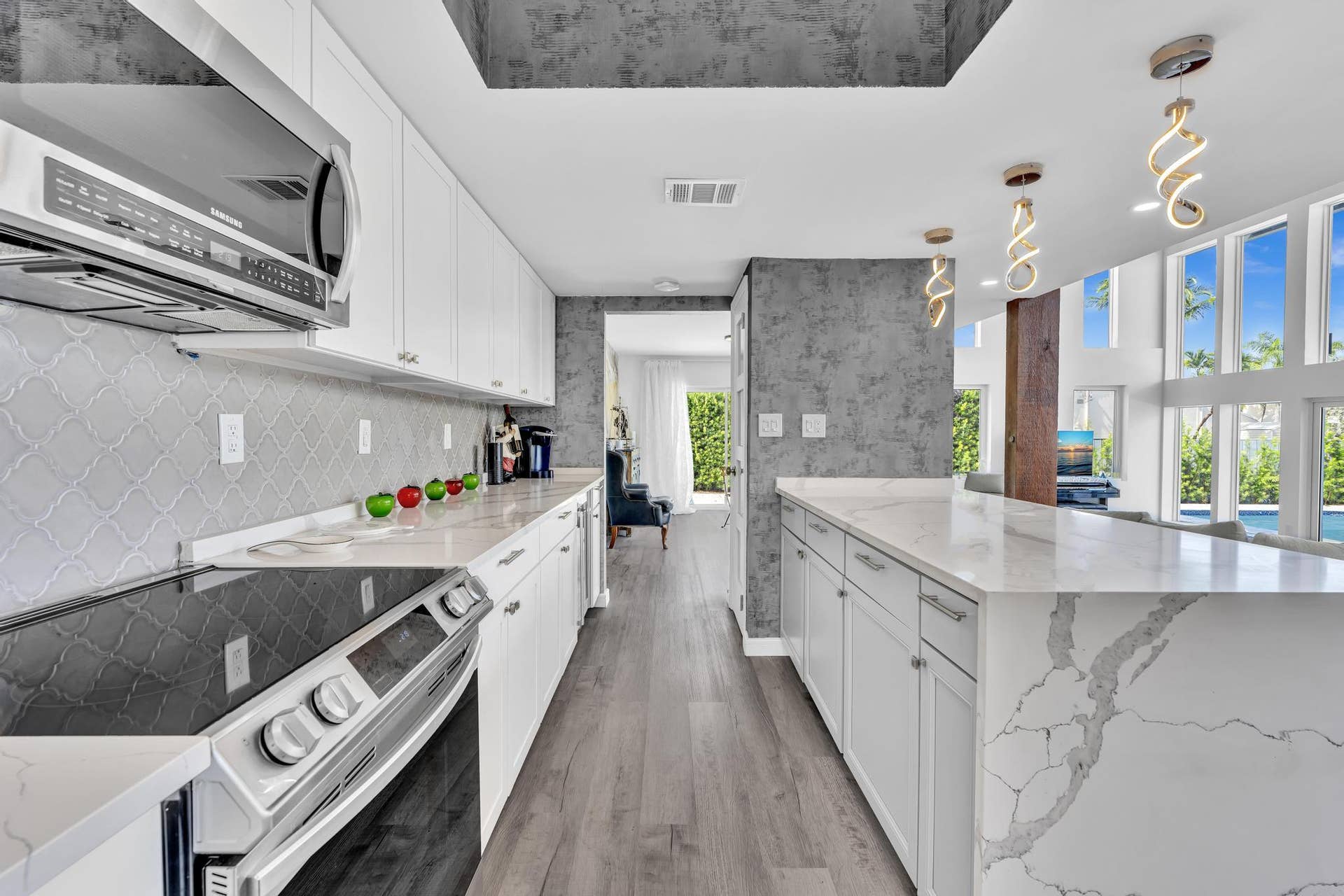 600 N VICTORIA Terrace, Fort Lauderdale, FL 33304 Open concept kitchen with marble counter tops and expansive counter space.