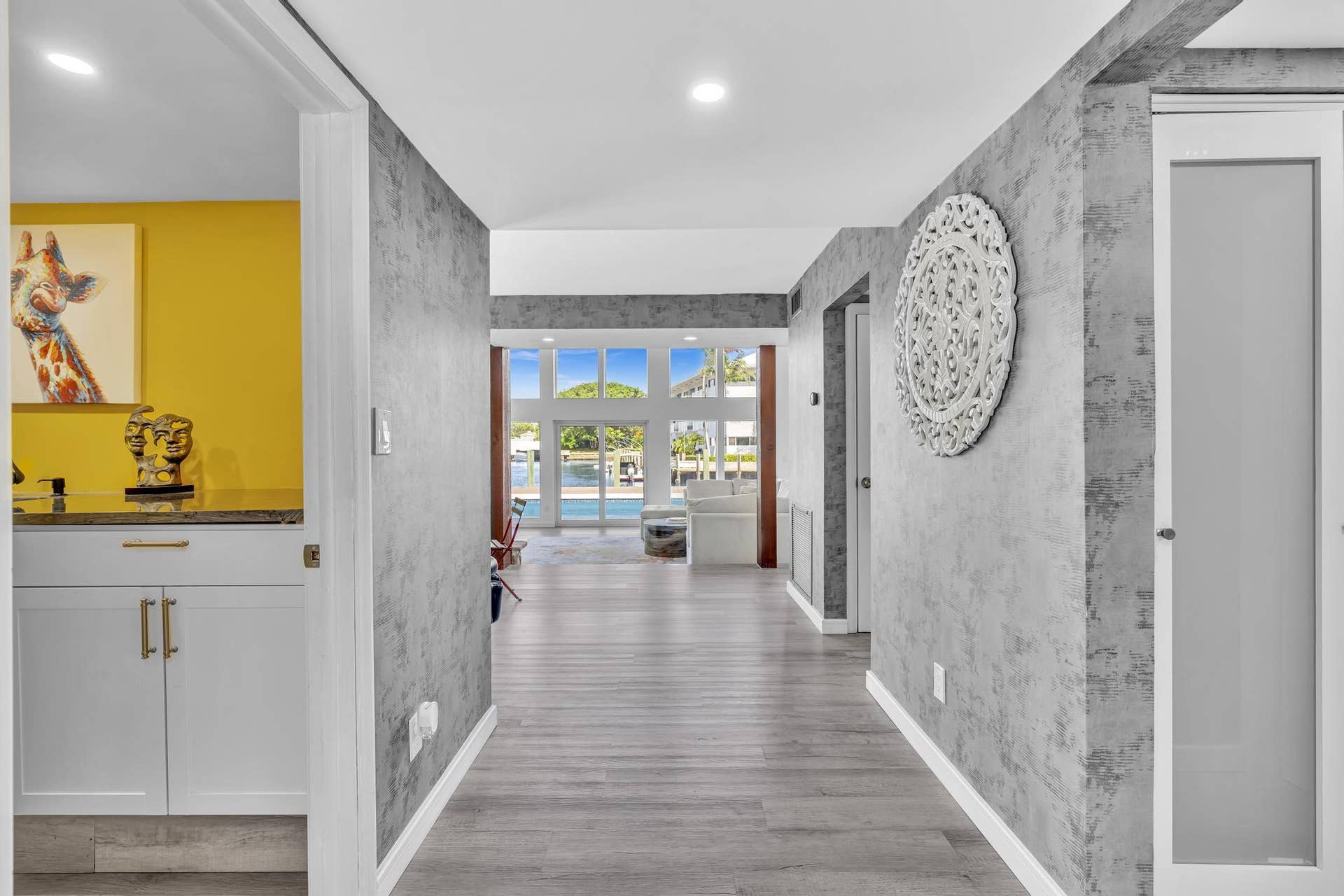 600 N VICTORIA Terrace, Fort Lauderdale, FL 33304 Laundry Room with washer and dryer, built in sink, and garage access