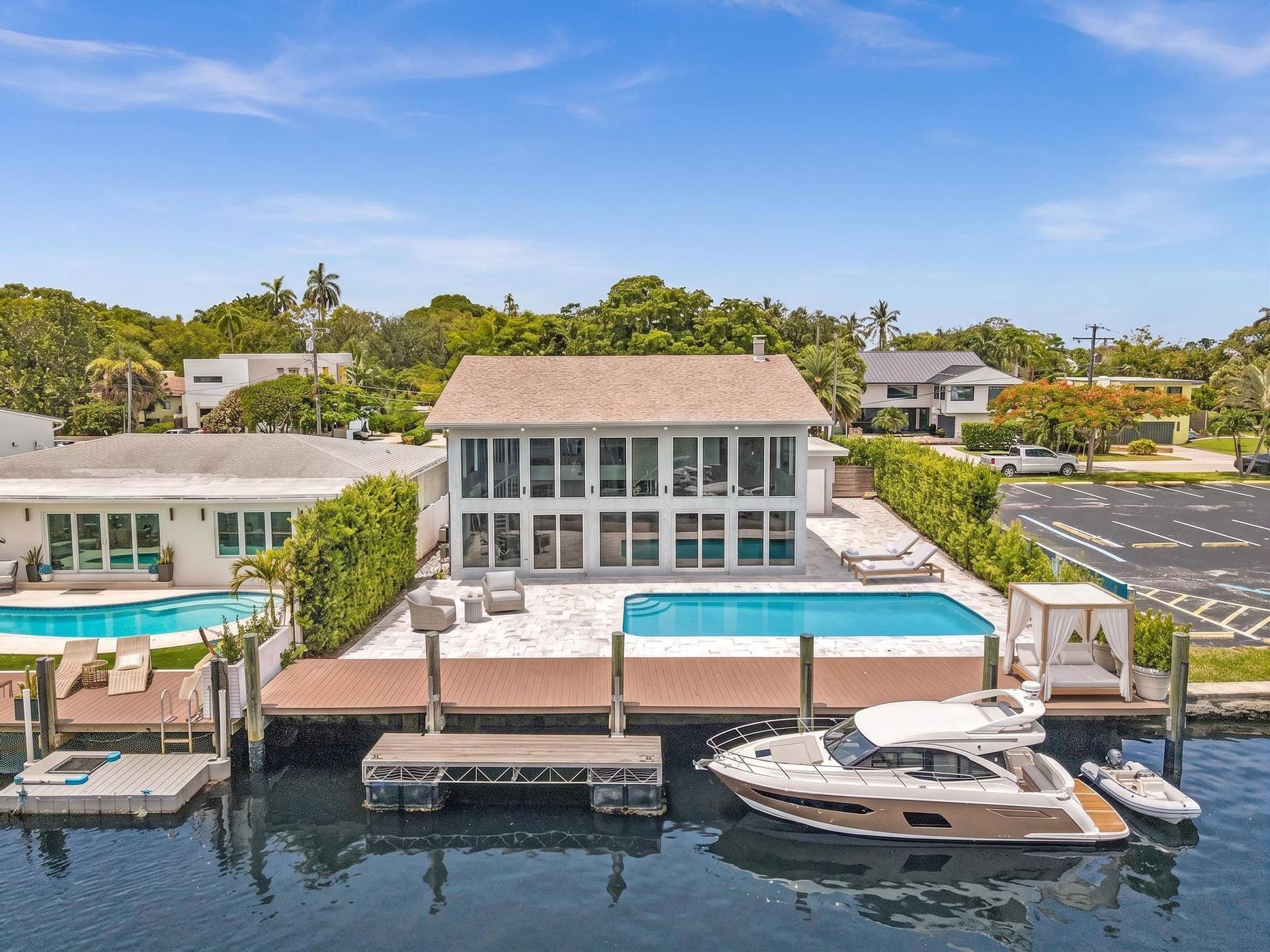 600 N VICTORIA Terrace, Fort Lauderdale, FL 33304 Back of home with vast pool and waterfront access. Virtually Staged