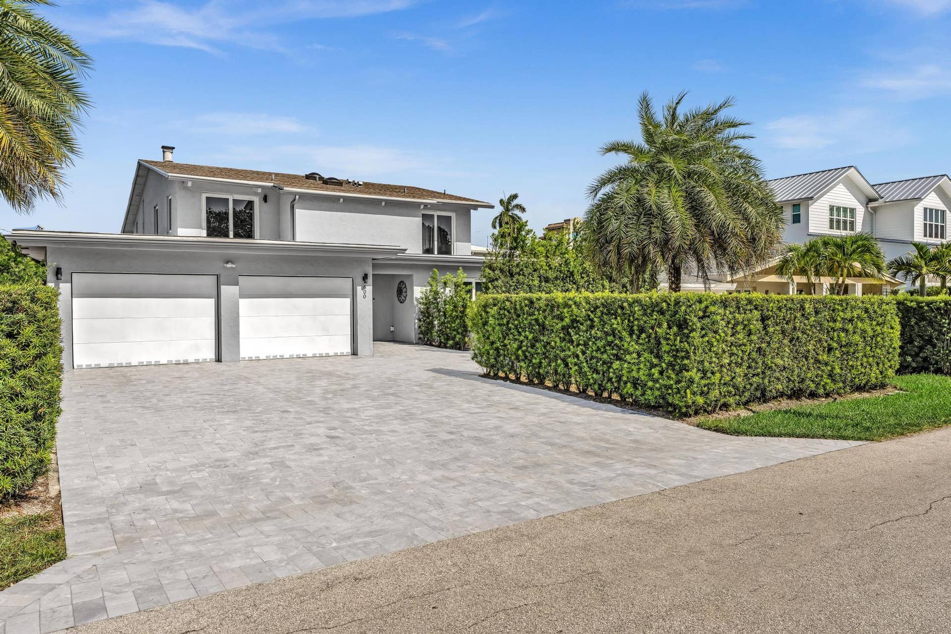 600 N VICTORIA Terrace, Fort Lauderdale, FL 33304 Front of Home with two car garage and paver driveway.