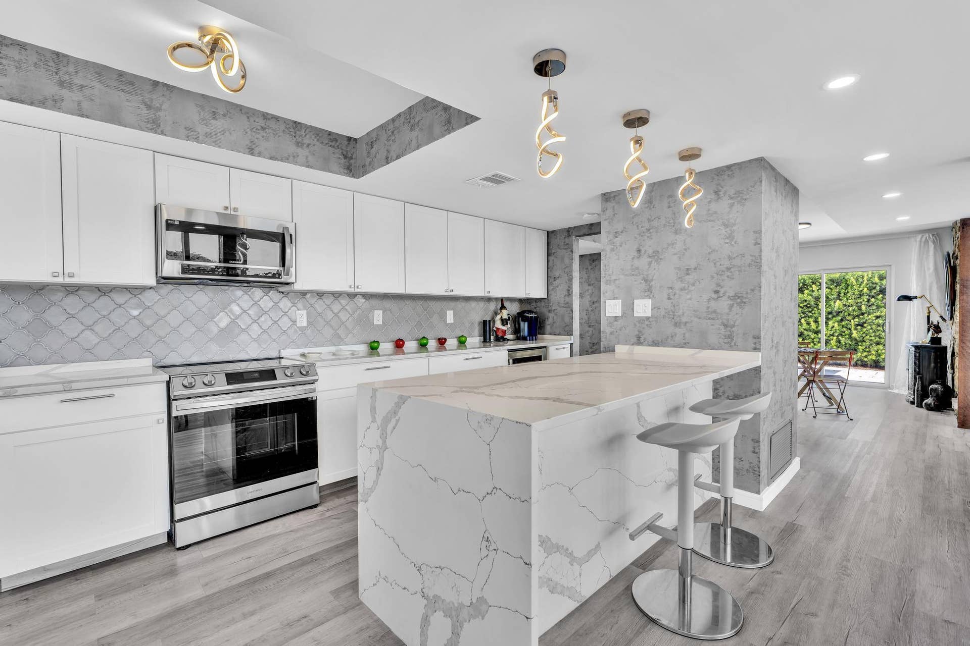 600 N VICTORIA Terrace, Fort Lauderdale, FL 33304 Open concept kitchen with marble counter tops and expansive counter space.