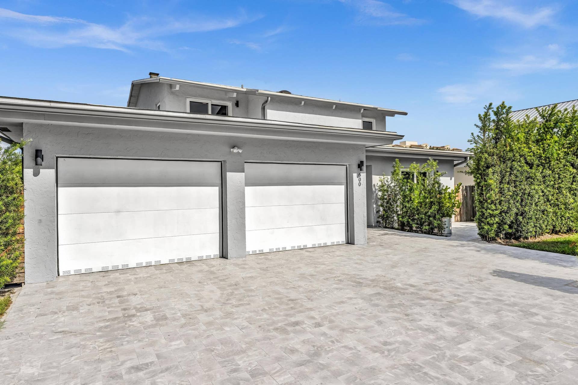 600 N VICTORIA Terrace, Fort Lauderdale, FL 33304 Front of Home with two car garage and paver driveway.
