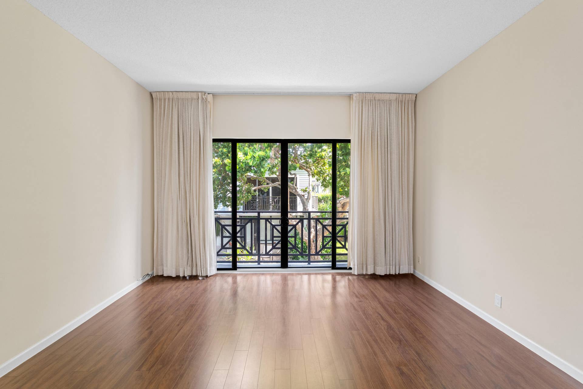 Family room with Juliet balcony/sliders