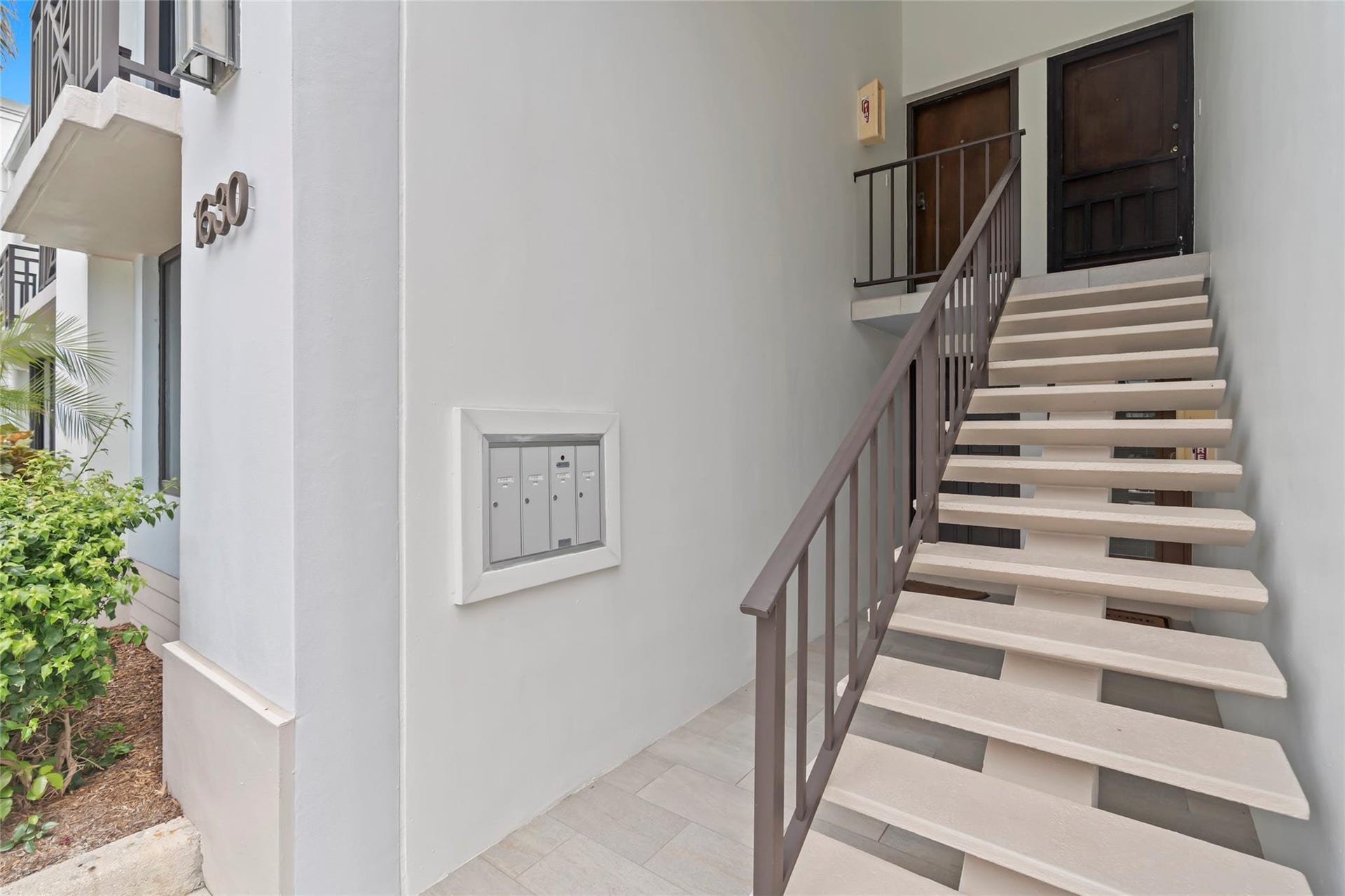 Stairs to unit on 2nd floor