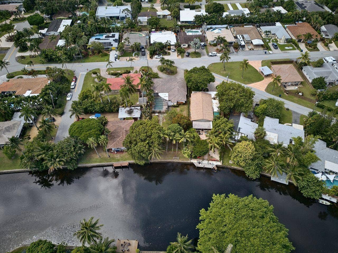 201 NE 29th Street, Wilton Manors, FL 33334 Elevated view showcases the propertys position along the water within an established residential neighborhood.