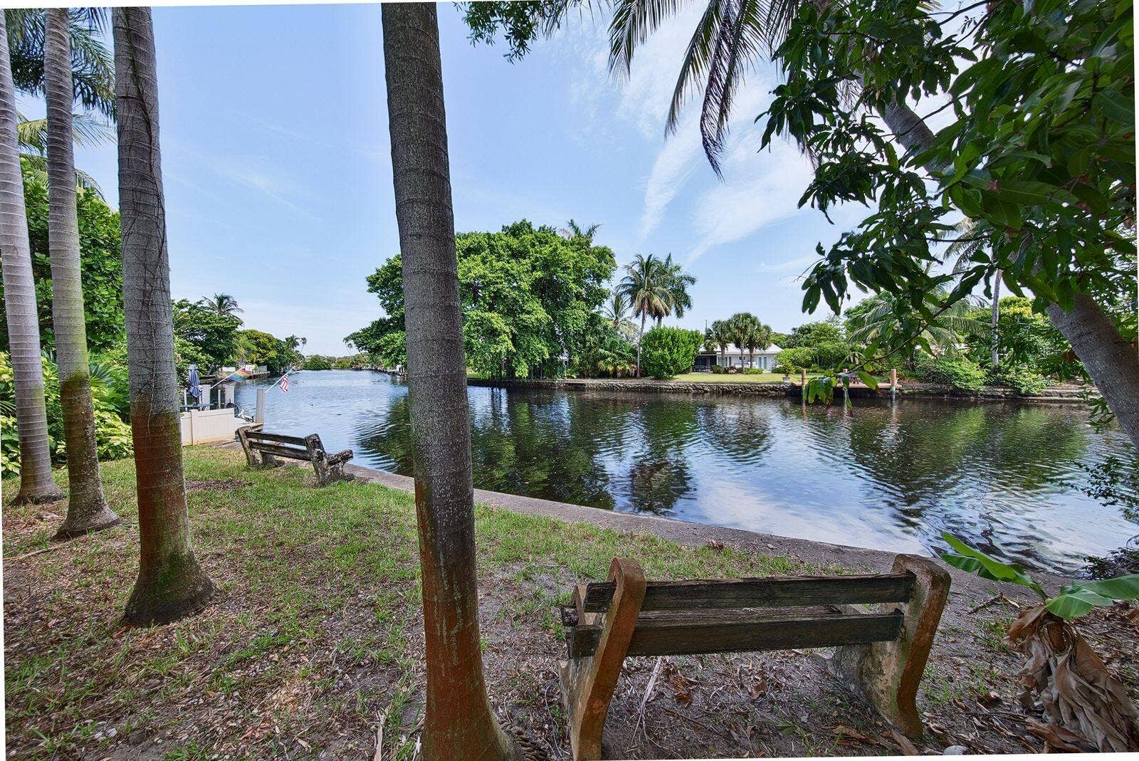 201 NE 29th Street, Wilton Manors, FL 33334 Peaceful canal views framed by mature tropical landscaping create a private South Florida setting.