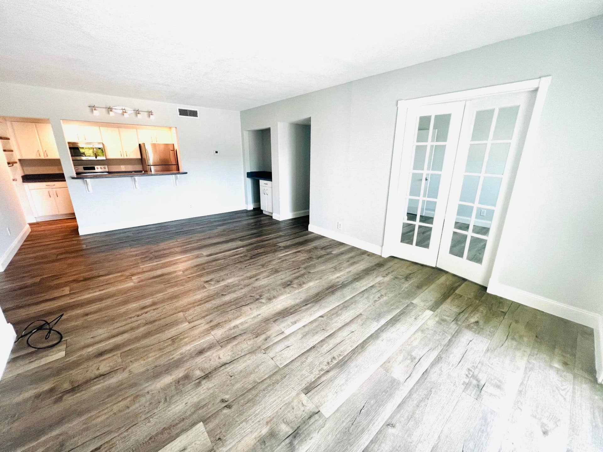 1000 River Reach Drive, #320, Fort Lauderdale, Fort Lauderdale, FL 33315 Open Plan Living-Dining room area to Den with French doors