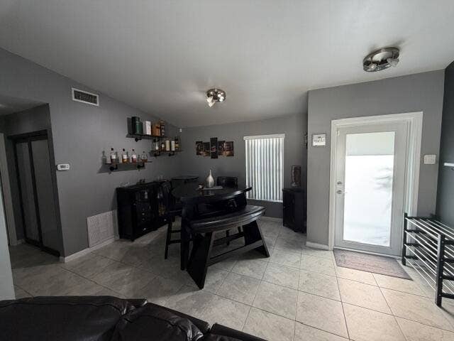 924 CUMBERLAND Terrace, Davie, FL 33325 Tile flooring throughout, recessed lighting, and a white framed door with frosted glass