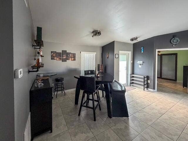 924 CUMBERLAND Terrace, Davie, FL 33325 Tile flooring, ceiling-mounted light fixtures, built-in shelving, and a glass-paneled door