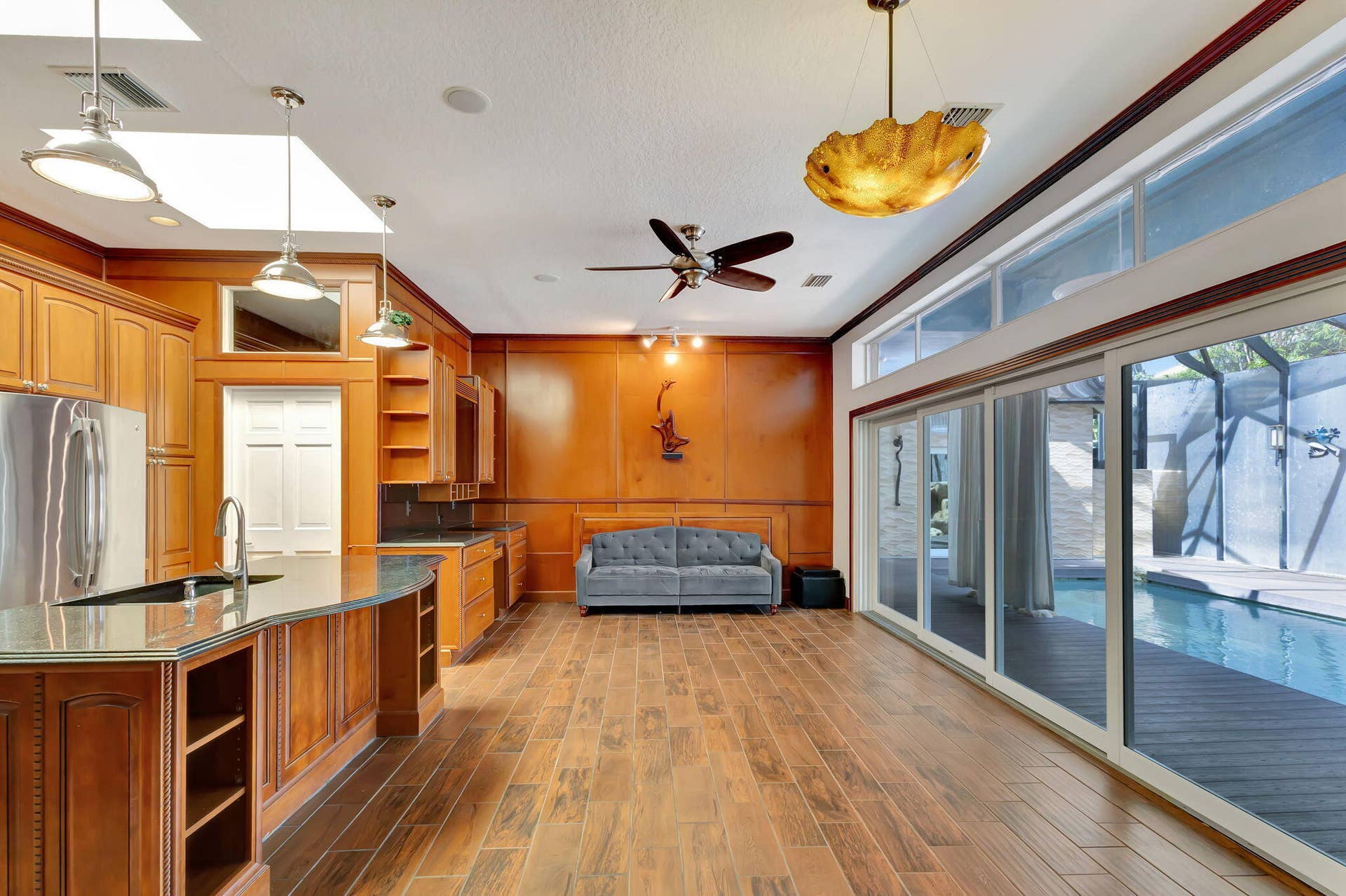 16334 PORT DICKINSON Drive, Jupiter, Jupiter, FL 33477 family room and kitchen