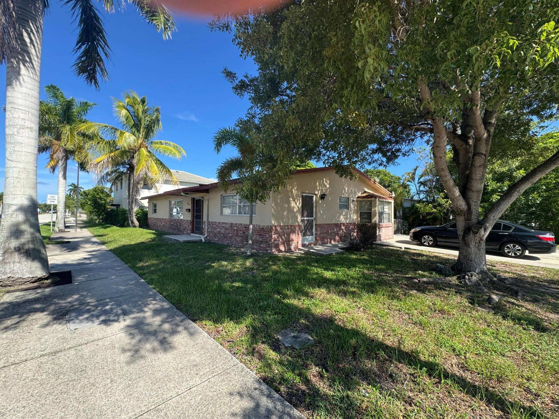 704 E HILLSBORO Boulevard, Deerfield Beach, FL 33441 FRONT AND SIDE VIEW