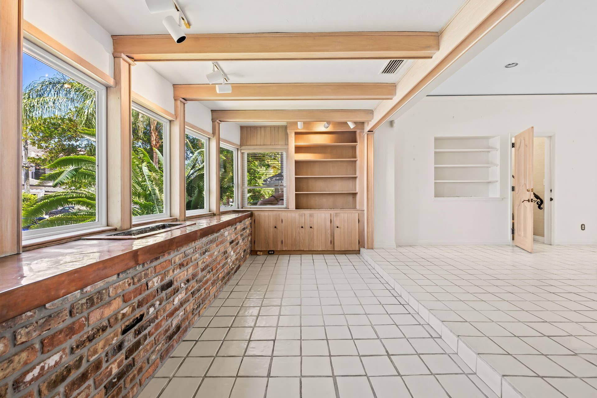 Living Areas. Home has impact glass & roof replacement circa 2021.