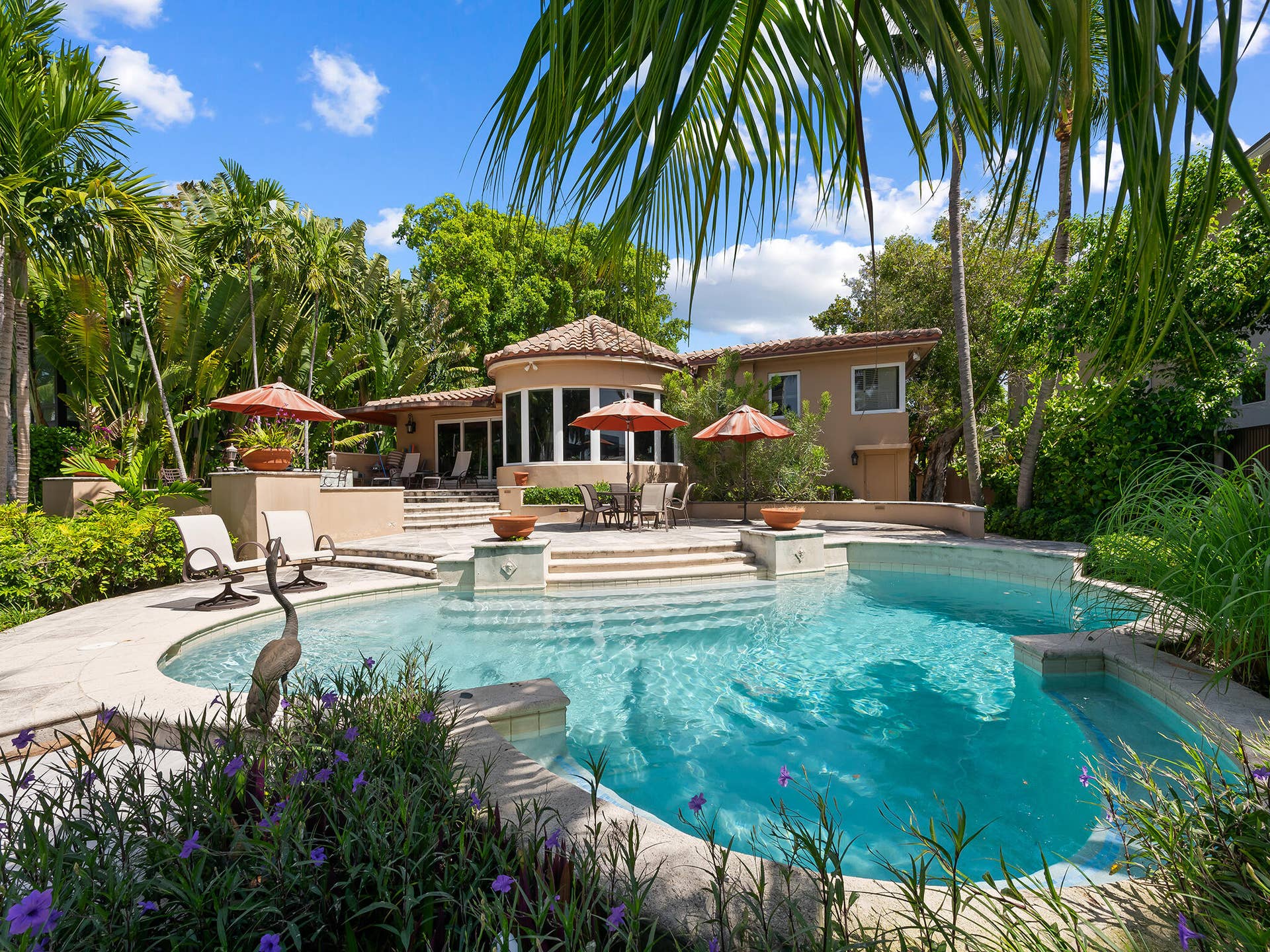 Pool has several seating areas