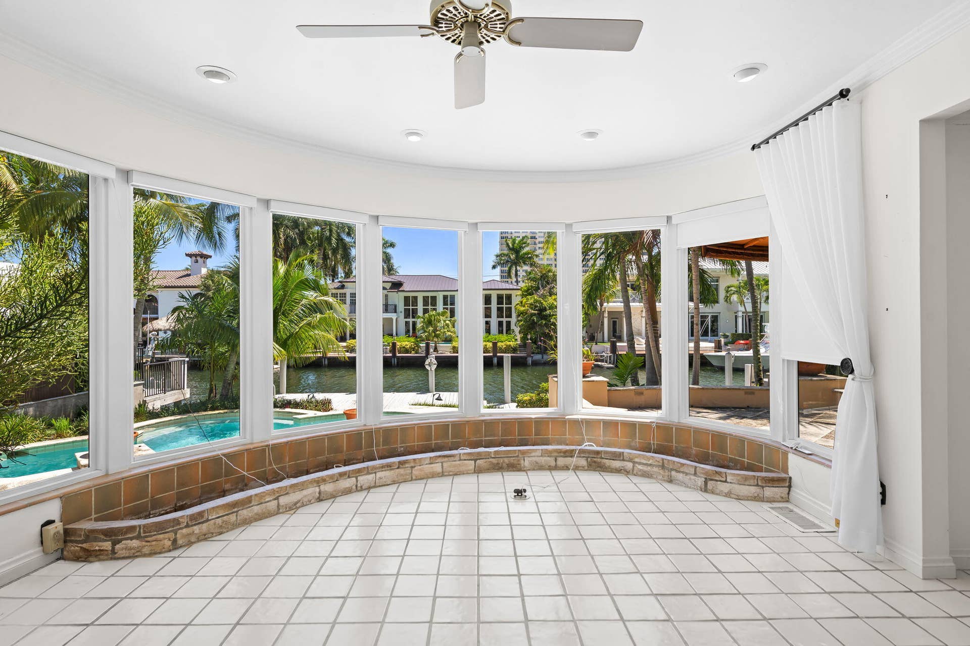 Living Areas. Home has impact glass & roof replacement circa 2021. roof.